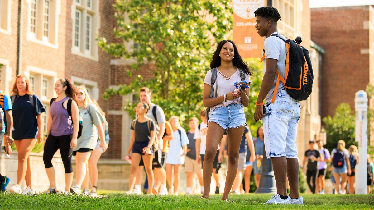 A student hangout and visit outside Ayres Hall during the first day of fall classes on August 21, 2019.