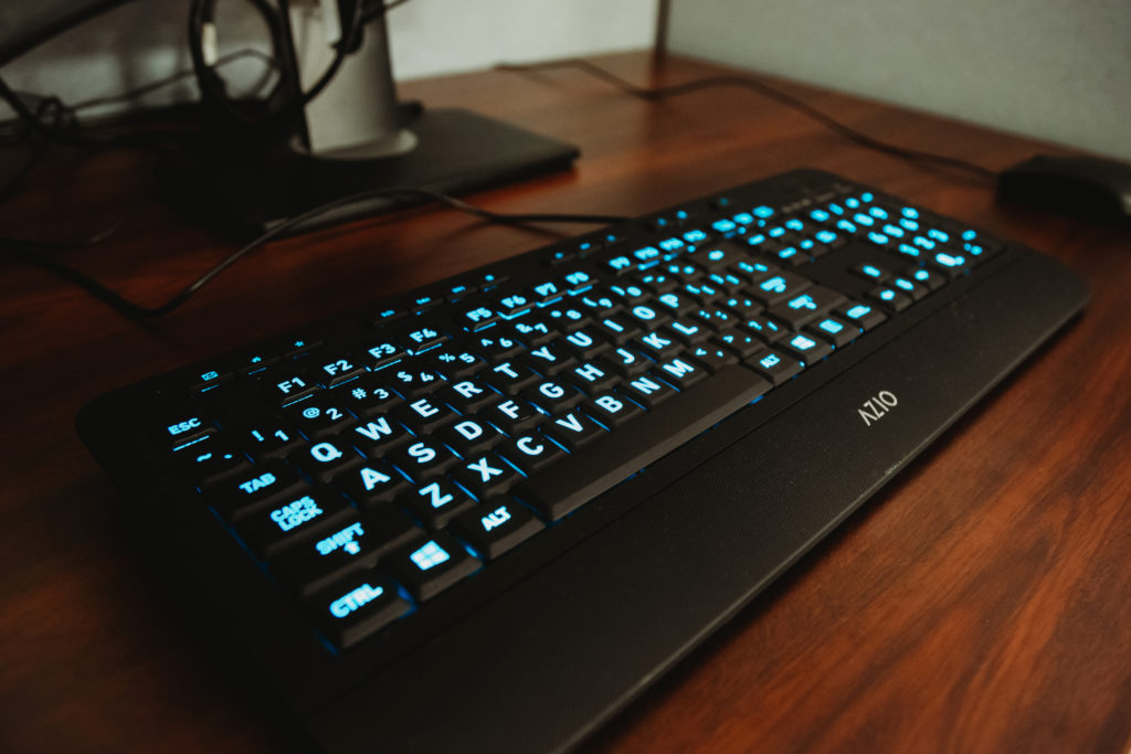 Large print Azio keyboard with adjustable LED colors. Keyboard color in picture is blue.